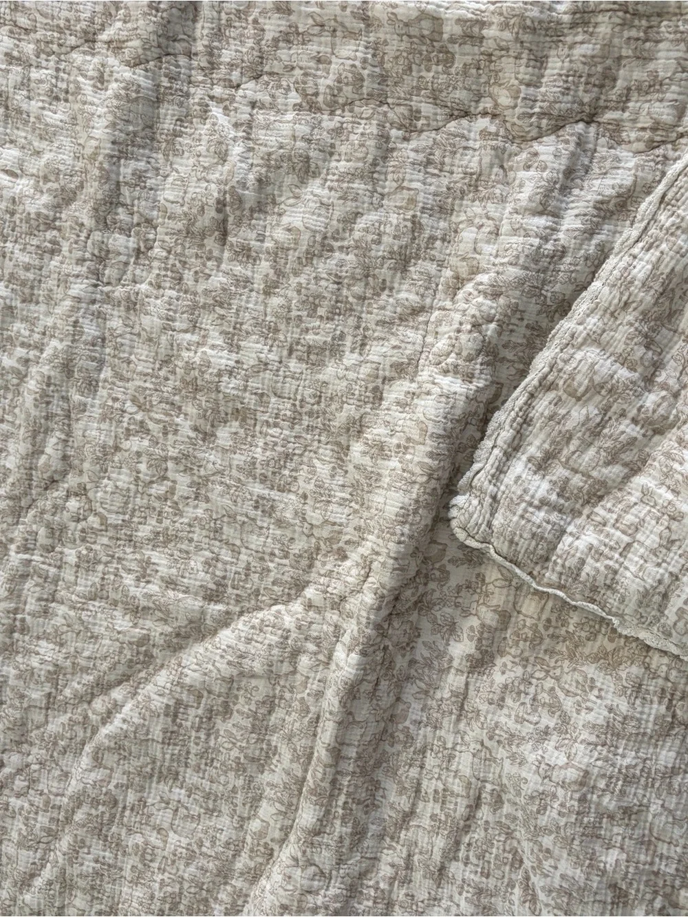 Neutral Beige Floral Quilted crib blanket with matching crib sheet mushie